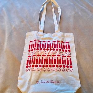 Sud de France cream with red appliqué sleek tote